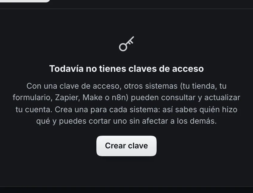 Pantalla «Configuración → Integraciones → API y avisos». Señalado con el número 2: el botón «Crear clave».